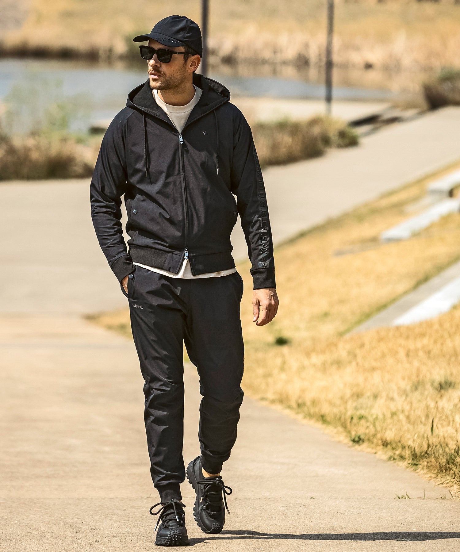 【MENS】GTX SIDE LOGO JOGGER PANTS サイドロゴジョガーパンツ / WINDSTOPPER(R) プロダクト by GORE-TEX LABS /ウィンドストッパー/ゴアテックス/1PIU1UGUALE3 RELAX × +phenix(ウノピゥウノウグァーレトレ リラックス)