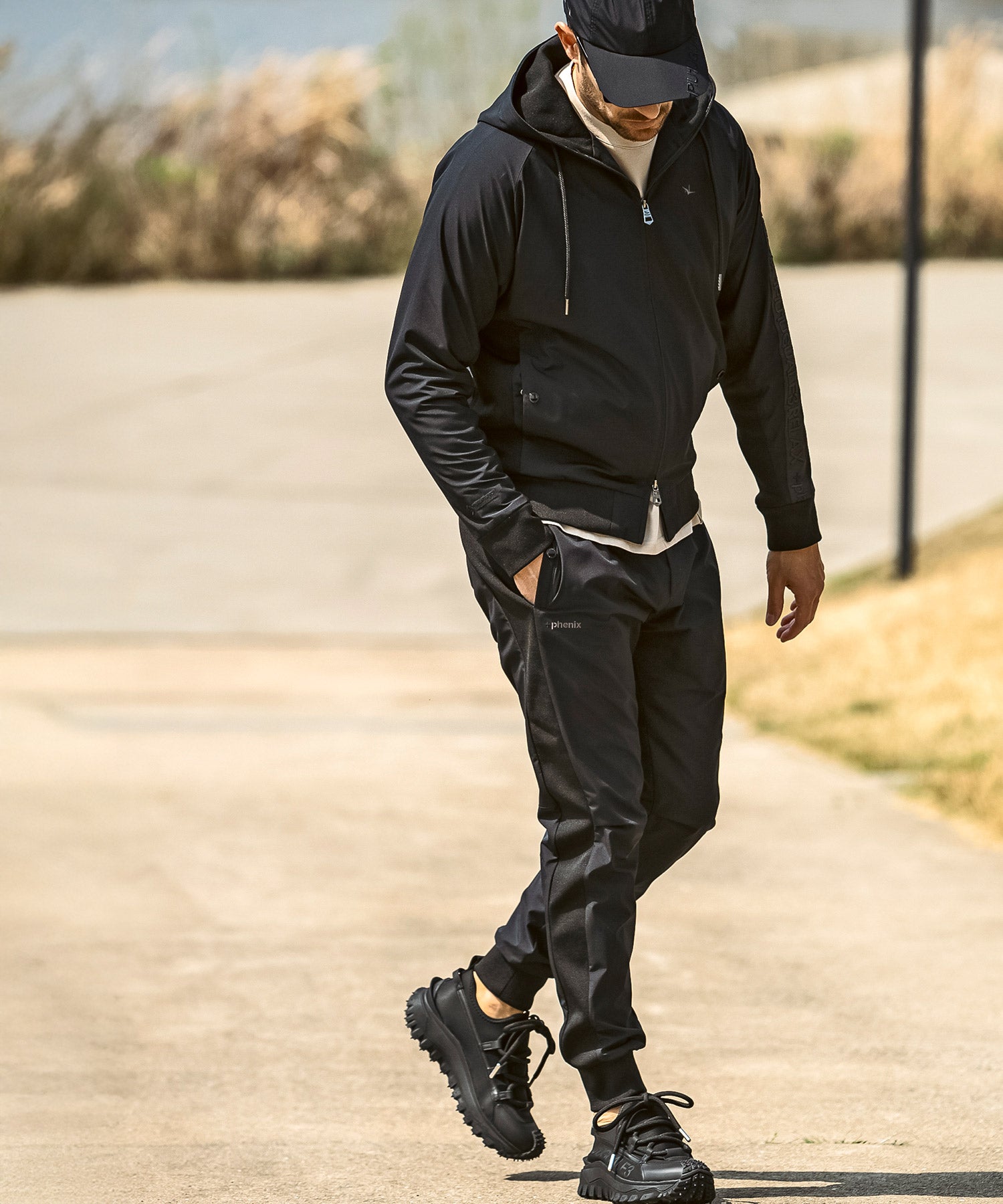 【MENS】GTX SIDE LOGO JOGGER PANTS サイドロゴジョガーパンツ / WINDSTOPPER(R) プロダクト by GORE-TEX LABS /ウィンドストッパー/ゴアテックス/1PIU1UGUALE3 RELAX × +phenix(ウノピゥウノウグァーレトレ リラックス)