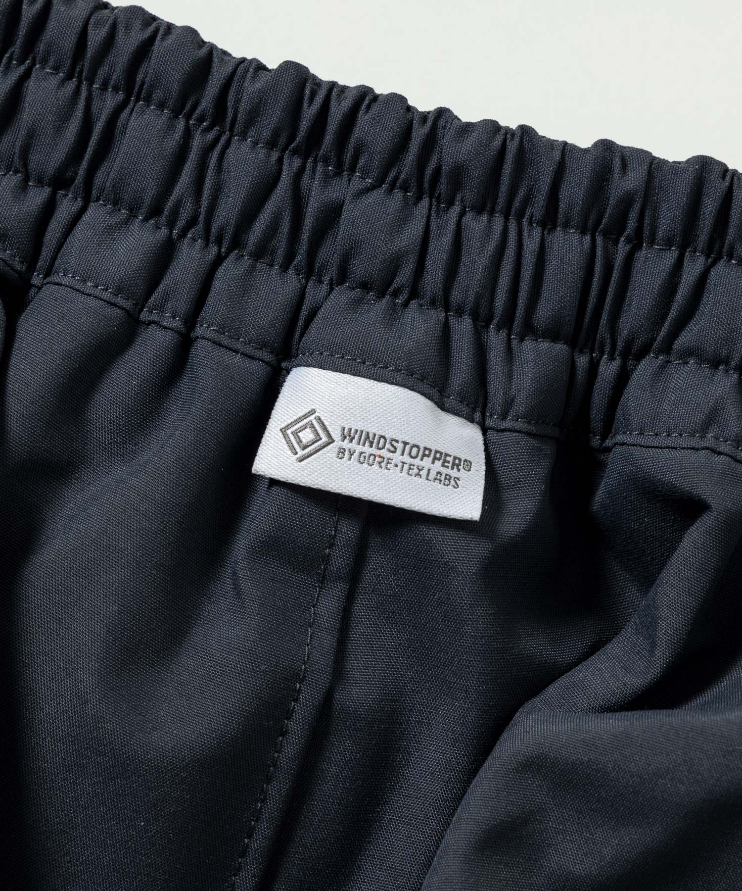 【MENS】WEATHER PROOF OVER PANTS ウェザープルーフオーバーパンツ / WINDSTOPPER(R) プロダクト by GORE TEX LABS / +phenix(プラスフェニックス)