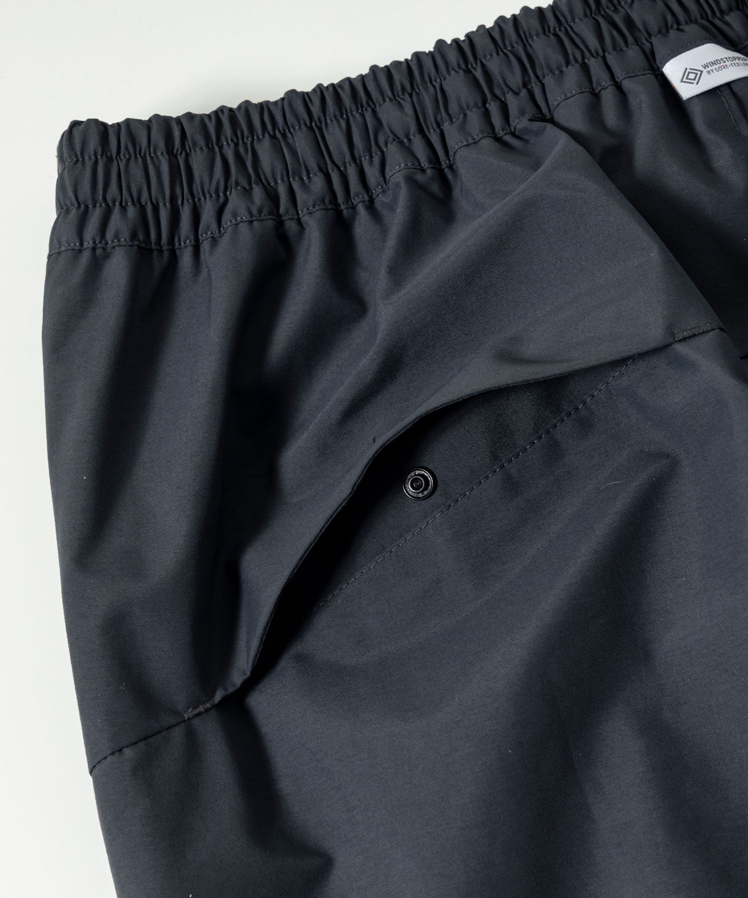 【MENS】WEATHER PROOF OVER PANTS ウェザープルーフオーバーパンツ / WINDSTOPPER(R) プロダクト by GORE TEX LABS / +phenix(プラスフェニックス)