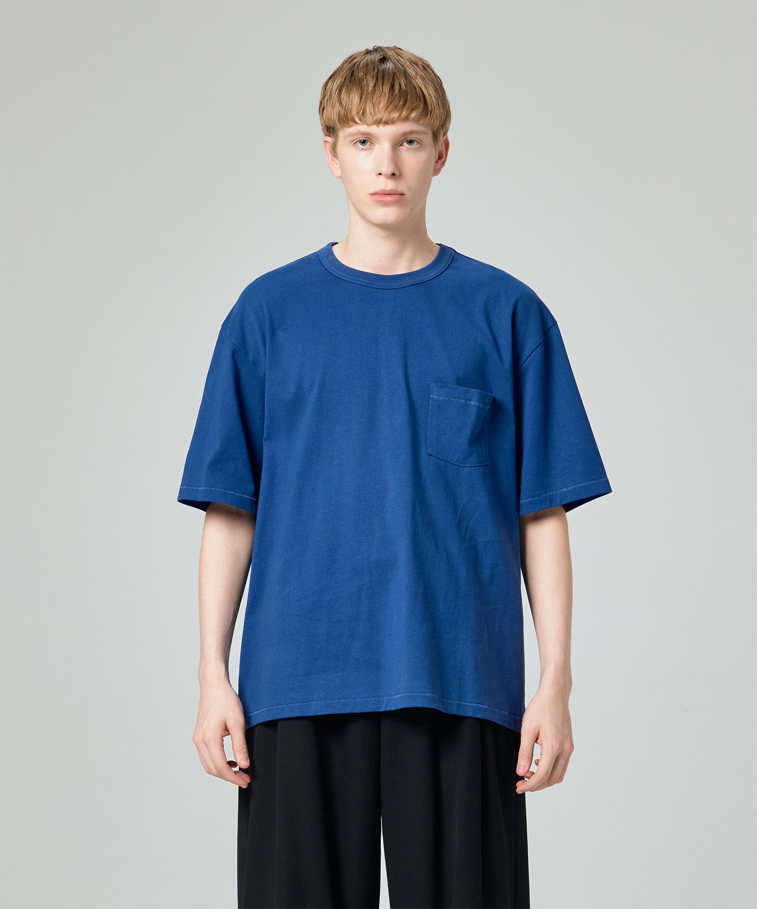 DISTORTED SLOGAN POCKET TEE