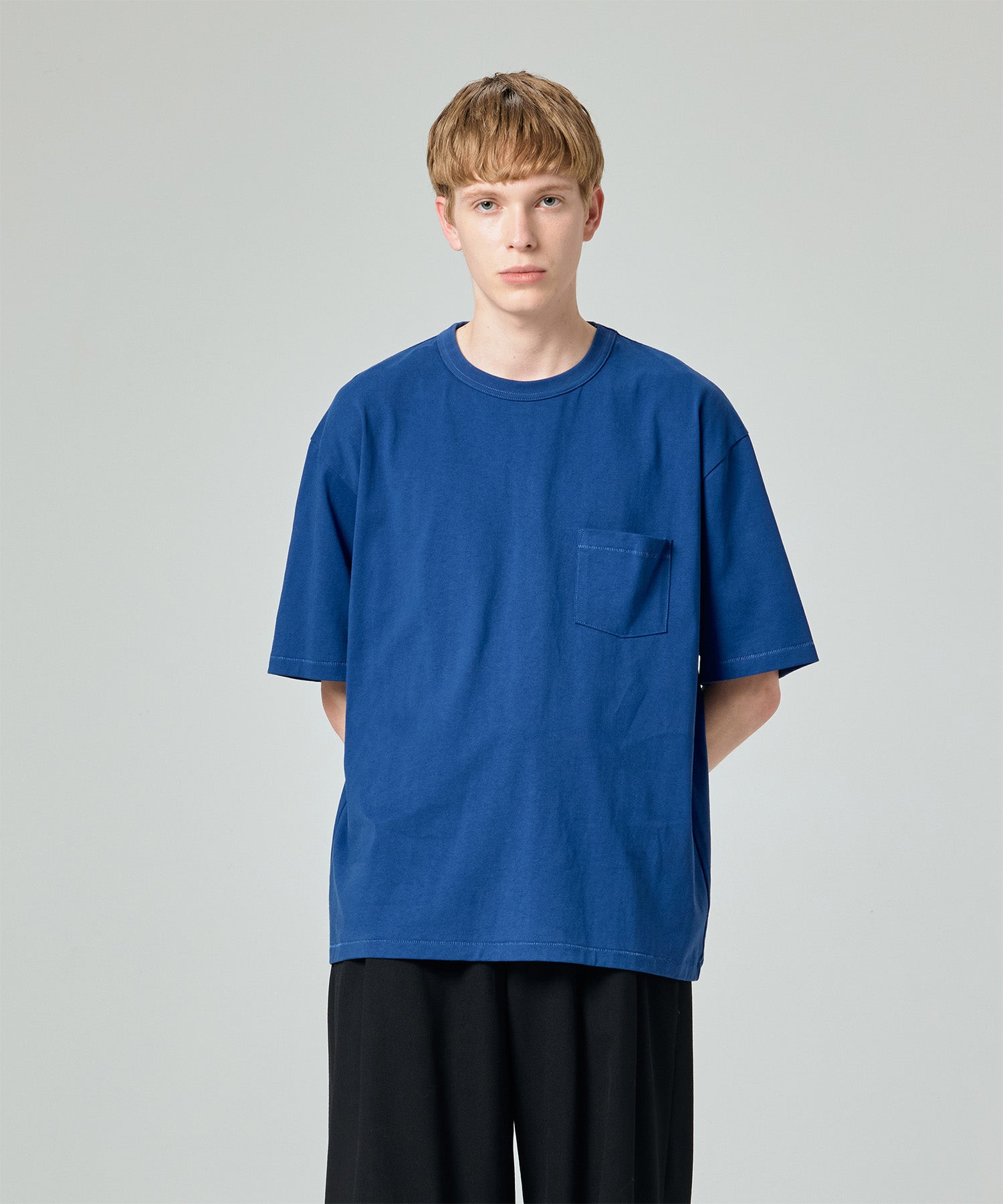 DISTORTED SLOGAN POCKET TEE