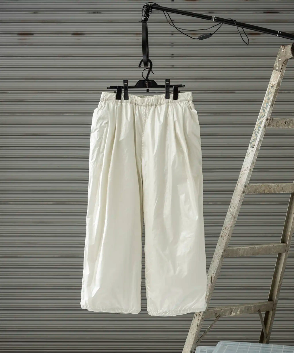 MENS】ワイドパンツ 中綿入りロングパンツ Insulated air wide pants / Brilliance shade down  proof / アルクフェニックス | alk phenix(アルクフェニックス)